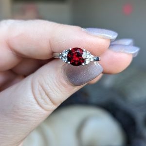 Genuine garnet and white topaz ring set in 925 sterling silver